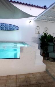 a swimming pool in a house with a slide at Catespero Sossego Villa in Reguengos de Monsaraz +3 photos