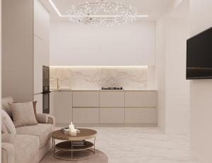 a living room with a couch and a table at Lutsk Elegance Apartment in Lutsk