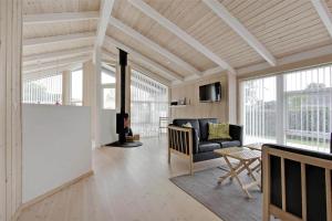 a living room with a couch and a table at 30078-Malling-Peter-Eriksensvej-21 in Malling