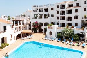 an image of a swimming pool in front of a building at Comitas Tramontana Park in Fornells