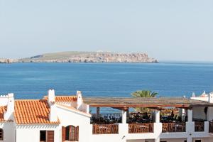 a view of the ocean from a building at Comitas Tramontana Park in Fornells