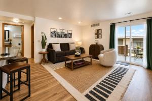 a living room with a couch and a table at Edelweiss Escape in Leavenworth