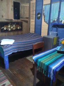 a bedroom with a bed and a table and a desk at Dorm in Hopkins