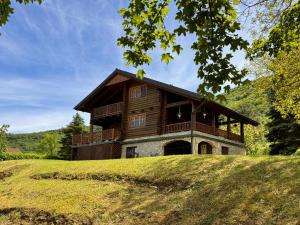 a large house on top of a hill at Pine River Dobrenica in Bihać