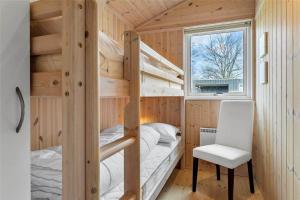 a couple of bunk beds in a tiny house at 30101-Malling-Noddevaenget-5-A in Malling