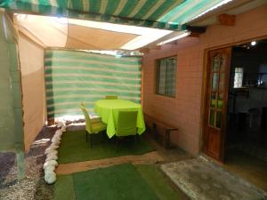 a room with a table and chairs in a tent at CASA DESERT in San Pedro de Atacama