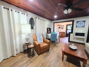 a living room with a couch chair and a table at #09 - Large Lakeview One Bedroom- Pet Friendly in Hot Springs