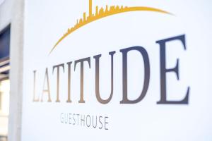 a sign for the alfred institute for architecture at Latitude Guest House in Cantanhede