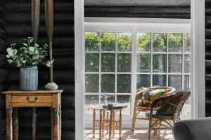 a room with a window and a table and chairs at 30192-Malling-Askvaenget-13 in Malling