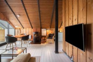 a living room with a flat screen tv on a wall at M404-Gedser-Frede-Buchsvej-3 in Gedser