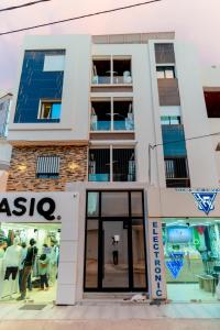 a building with a store in front of it at Liveable artwork in Sousse