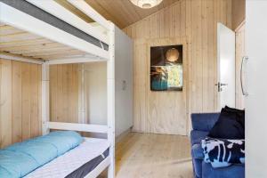 a small room with a bunk bed and a couch at 30042-Malling-Peter-Eriksens-Vej-20 in Malling