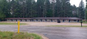 a building with a parking lot in front of it at TeePee Room 17- Full Kitchen in Roscommon
