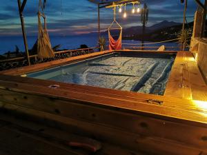 a swimming pool on a boat on the water at Apartment SPA Carpe Diem 1 in Utjeha