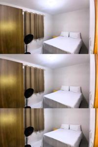 a room with two beds and a chair in it at Apto Completo São João com Garagem e Piscina in Campina Grande