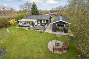 an aerial view of a house with a yard at C11712-Bork-Havn-Magevaenget-17 in Falen