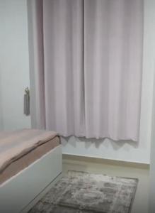 Llit o llits en una habitació de Flats