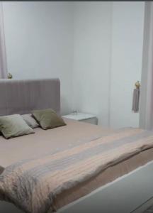 Llit o llits en una habitació de Flats