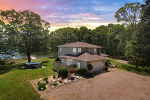 an overhead view of a house with a yard at Waterfront Estate w Hot Tub, Dock & Kayaks in Stonington