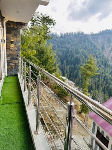a balcony with a view of the mountains at Apartment In Ayubia in Naka
