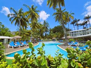 a view of the pool at the resort at Tropical Chic Studio - Marina View - Swimming Pool in Les Trois-Îlets