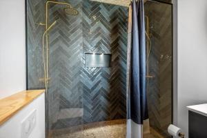 a shower with a glass door in a bathroom at 30433-Saksild-Strand-Odder-Strandlodden-2 in Rude +24 photos