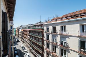 an overhead view of a city street with buildings at Rosales Suites in Madrid