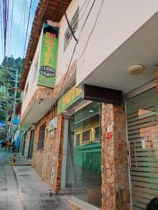 a store front of a building on a street at Hotel Cerro Bravo in Fredonia +6 photos