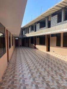 an empty courtyard of a school building at Pacasmagic Surf&Kite in Pacasmayo