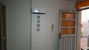 a room with a door and a door at Alto Unimev II in Guaymallen