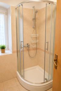 a shower with a glass enclosure in a bathroom at Guest House Emilio 1 in Split +11 photos