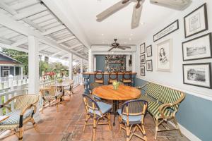 a patio with a wooden table and chairs at Hotel Panamonte in Boquete