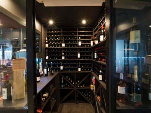 a wine cellar with a bunch of wine bottles at Hotel ibis Narbonne in Narbonne +151 photos