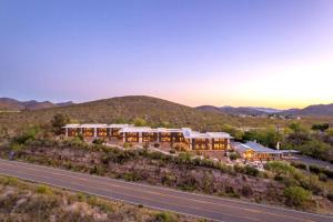 an aerial view of a resort with a road at Tombstone Lookout Lodge, SureStay Collection by Best Western in Tombstone