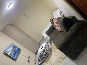 an overhead view of a living room with stairs at Reiroy homes in Kikuyu