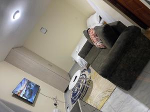 an overhead view of a living room with stairs at Reiroy homes in Kikuyu
