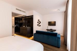 TV a/nebo společenská místnost v ubytování Hotel Rubens-Grote Markt
