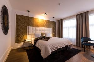 Postel nebo postele na pokoji v ubytování Hotel Rubens-Grote Markt