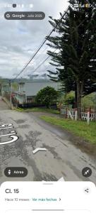 a screenshot of a picture of a road at Hotel Los alpes in Garagoa