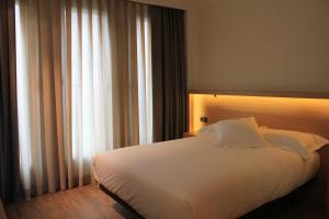 Posteľ alebo postele v izbe v ubytovaní Hotel Araba