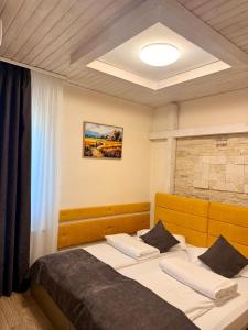a bedroom with a bed in a room at Casa Teo in Mahmudia +154 photos