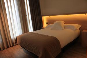 Posteľ alebo postele v izbe v ubytovaní Hotel Araba