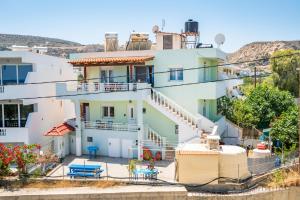 a house on the side of a river at Spacious 2BR Apartment with Balconies in Karpathos