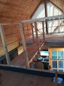 an inside view of a room in a attic at MiNi chalet en bois in Menzel Abderhaman