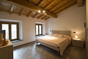 Llit o llits en una habitació de Le Casine del Borgo