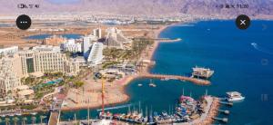 an aerial view of a city and the ocean at shohamseaview in Eilat