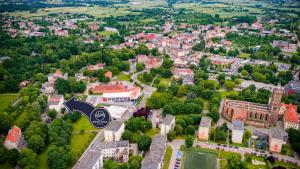 an aerial view of a city with a building at Nysa Gubin in Gubin
