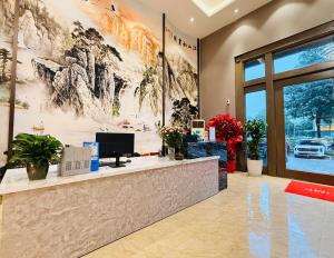 a lobby of a store with a reception desk at Kim Thành Hotel in Bắc Ninh