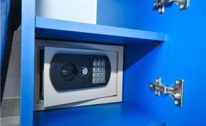 a blue counter with a microwave in a blue cabinet at Stojko Rafailovici in Rafailovici