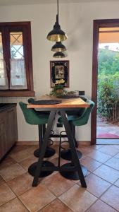 a table in a kitchen with a keyboard on it at The Cozy Nest in Santa Maria a Monte